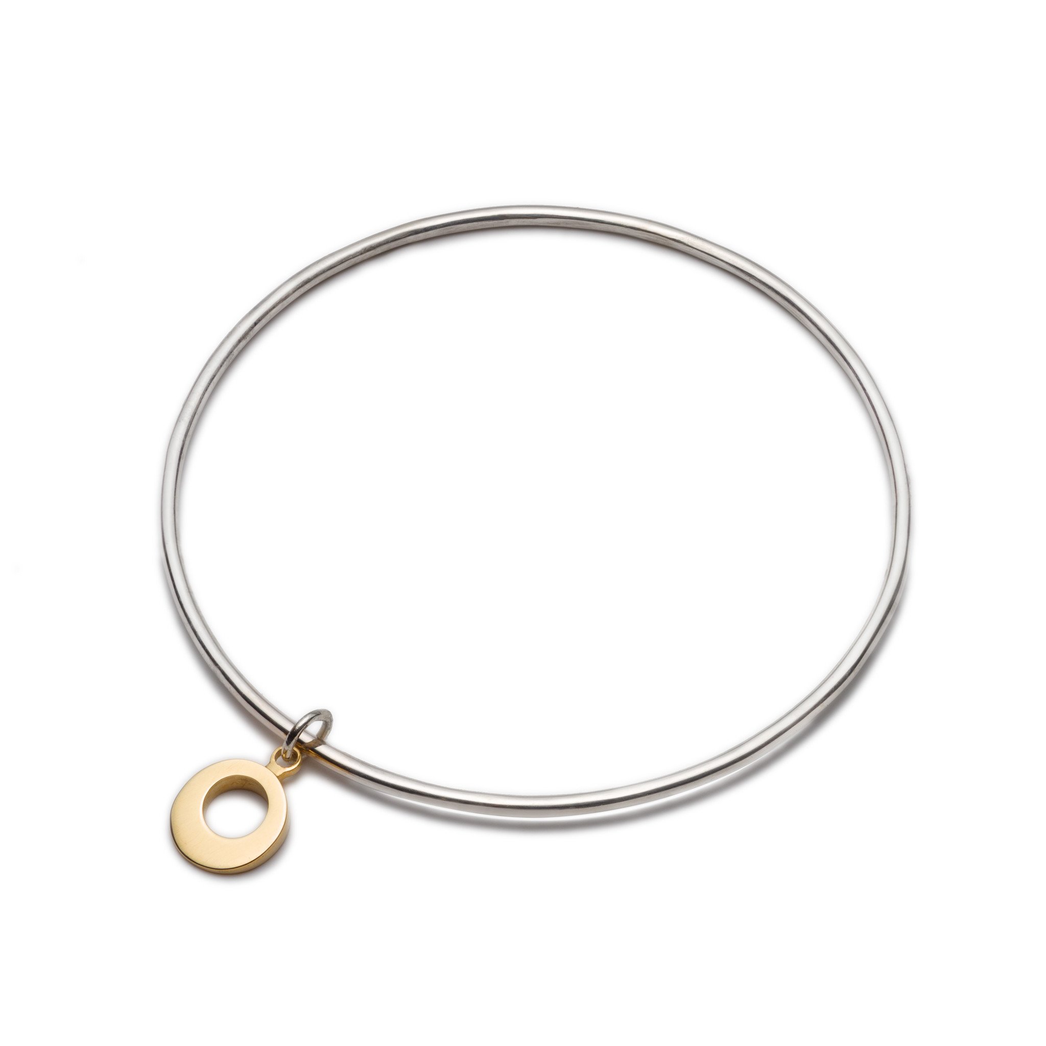Silver Bangle with Gold Charm. Unique designer jewellery handcrafted in Ireland.