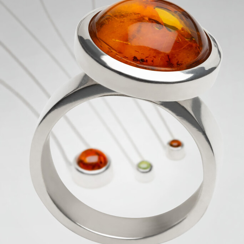 Balance amber silver ring